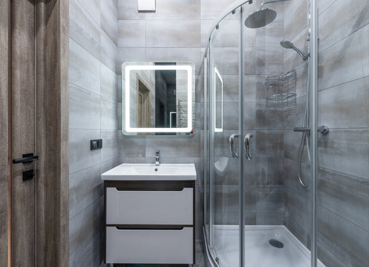 Bathroom with tile shower and sink